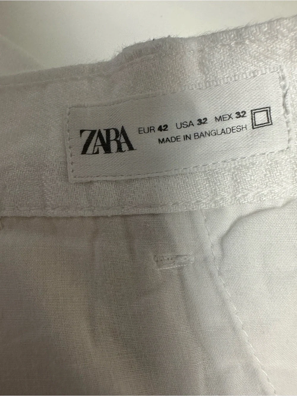 Zara women’s size 32 white 100% linen trousers straight leg tailored pleated